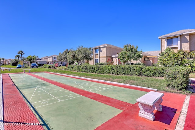 view of community with shuffleboard and a residential view