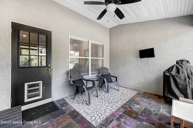 view of patio featuring a ceiling fan