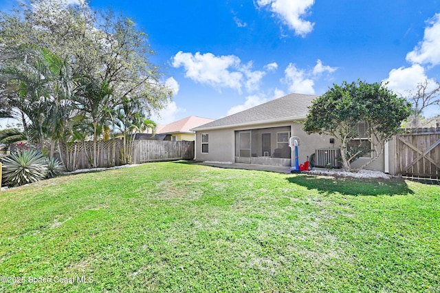 view of yard featuring a fenced backyard and cooling unit