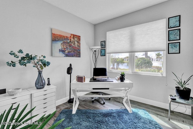 3465 Diamond Leaf Dr, Vero Beach, FL 32966 - office space featuring wood finished floors and baseboards