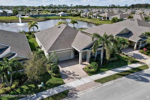 3465 Diamond Leaf Dr, Vero Beach, FL 32966 - bird's eye view featuring a water view and a residential view