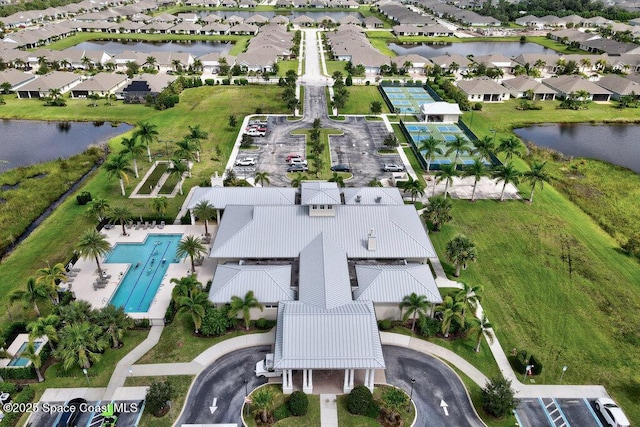 3465 Diamond Leaf Dr, Vero Beach, FL 32966 - birds eye view of property with a water view and a residential view