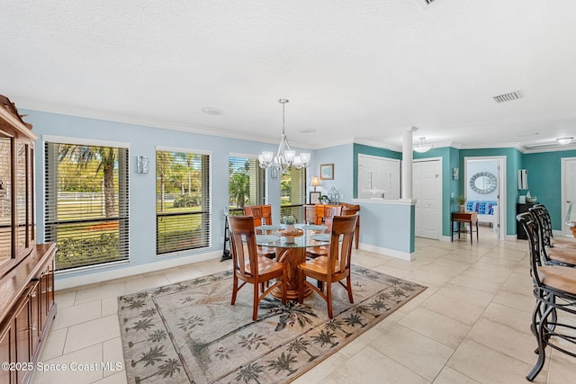 dining space with crown molding, light tile patterned floors, visible vents, and a textured ceiling