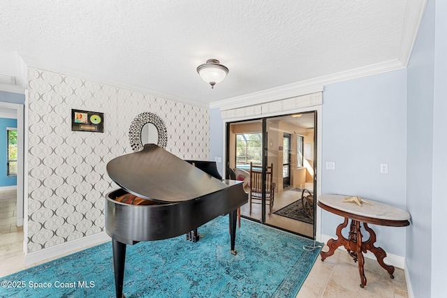 office space with a textured ceiling, wallpapered walls, crown molding, and baseboards