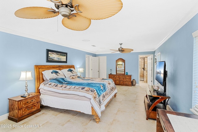 bedroom with a ceiling fan, ensuite bathroom, baseboards, and ornamental molding