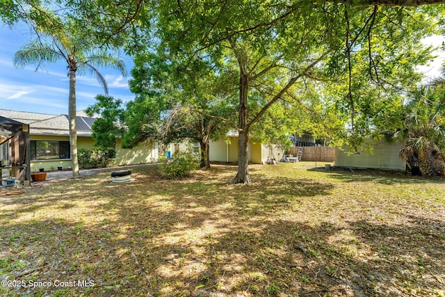 view of yard with fence