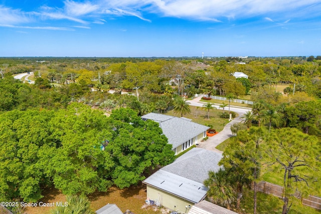 bird's eye view featuring a view of trees