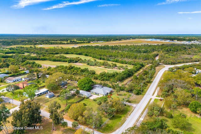 aerial view featuring a forest view