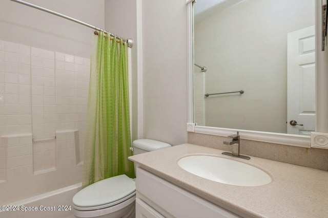 full bath with shower / bath combination with curtain, vanity, and toilet