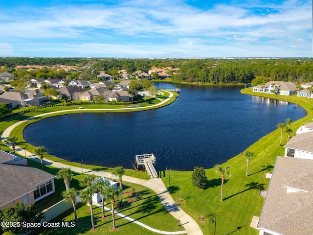 aerial view featuring a residential view and a water view