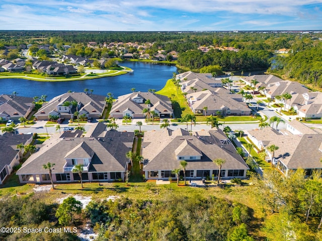 aerial view featuring a water view and a residential view