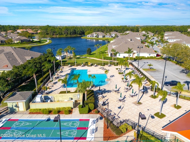 aerial view with a residential view and a water view