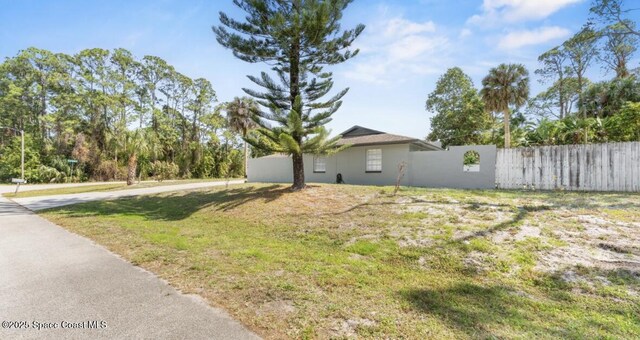 view of yard with fence