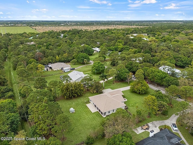 drone / aerial view with a forest view