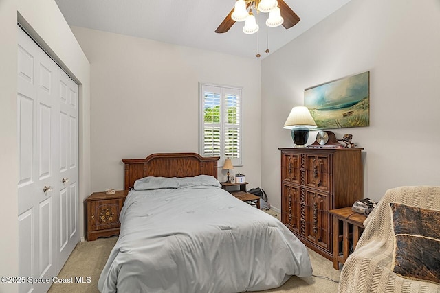 bedroom with carpet, a ceiling fan, and a closet