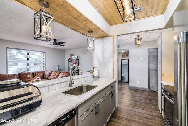 kitchen featuring dark wood-style flooring, a sink, a ceiling fan, open floor plan, and stainless steel electric stove