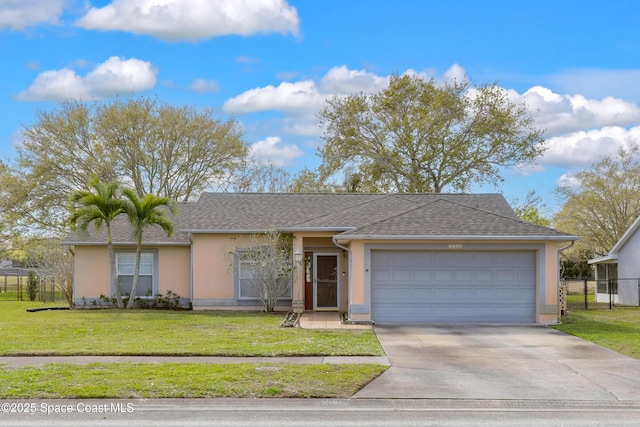 3060 Sweet Oak Dr, Melbourne, FL 32935 - ranch-style house with roof with shingles, stucco siding, concrete driveway, an attached garage, and a front yard