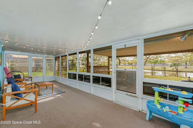 sunroom with rail lighting