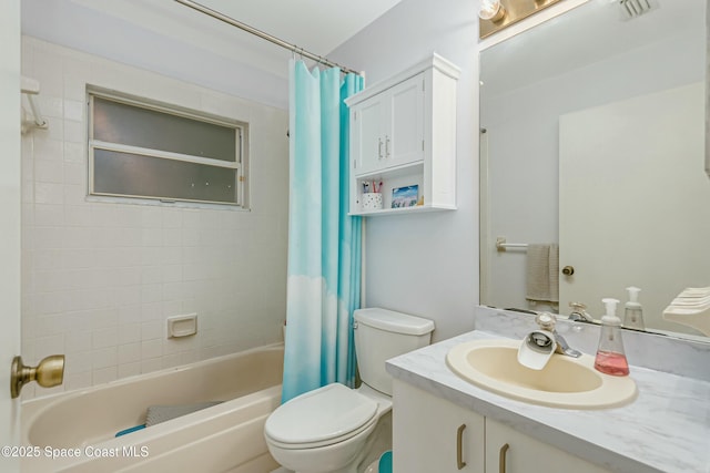 full bathroom featuring vanity, toilet, and shower / tub combo with curtain