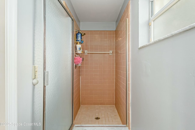 full bathroom featuring a stall shower