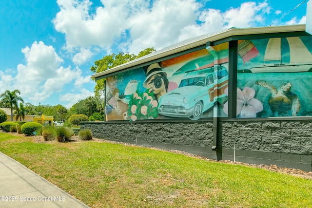 view of home's exterior featuring a yard