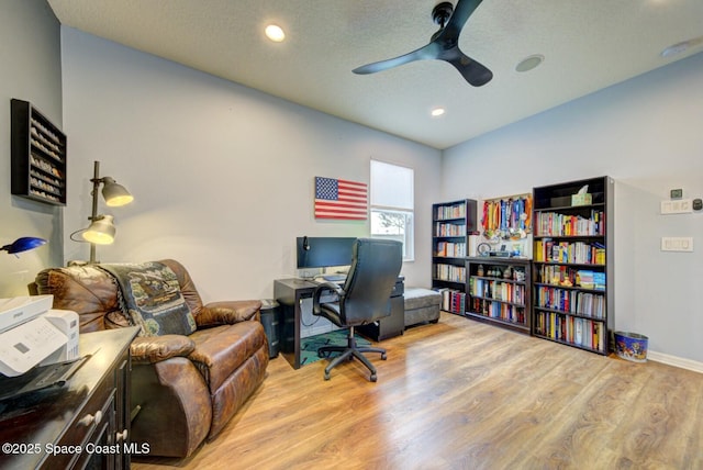 home office featuring a ceiling fan, recessed lighting, baseboards, and wood finished floors