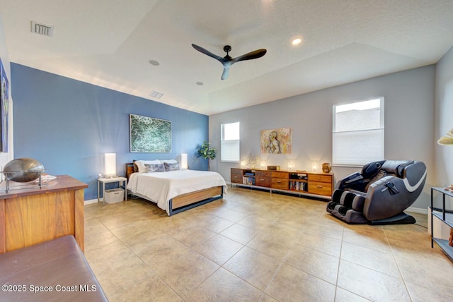 bedroom with light tile patterned floors, baseboards, and visible vents