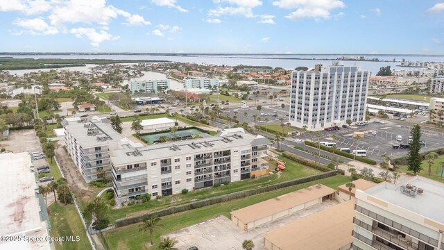 aerial view with a water view and a city view