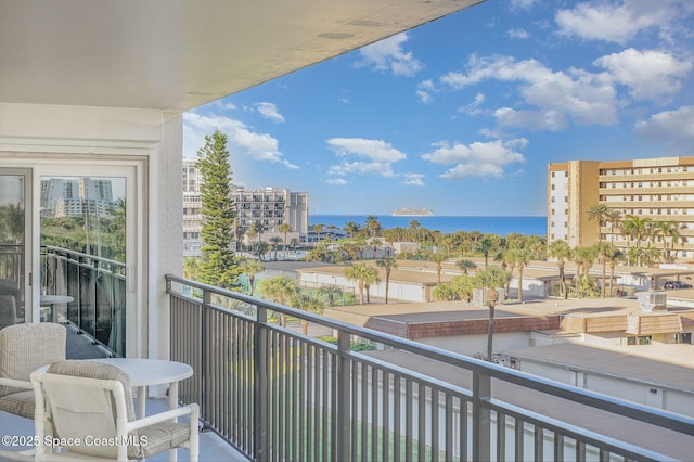 balcony featuring a water view