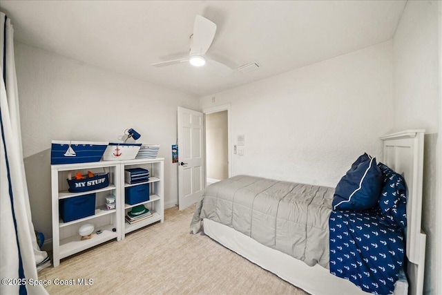 bedroom featuring carpet and ceiling fan