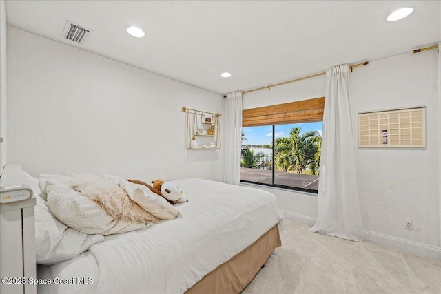 bedroom featuring visible vents, baseboards, recessed lighting, access to outside, and light colored carpet