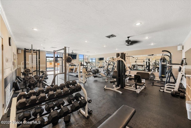 workout area featuring recessed lighting, a textured ceiling, and a ceiling fan