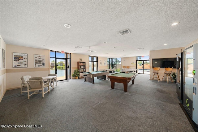 rec room featuring visible vents, a textured ceiling, recessed lighting, carpet, and pool table