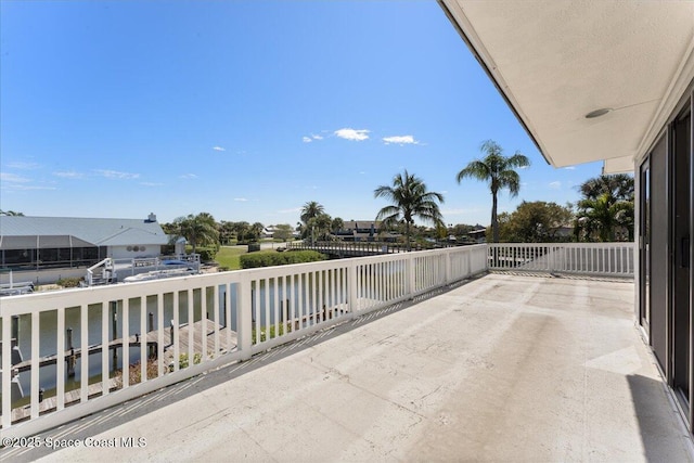 view of patio featuring a balcony