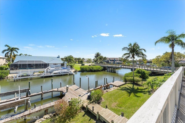 view of dock with a water view and boat lift