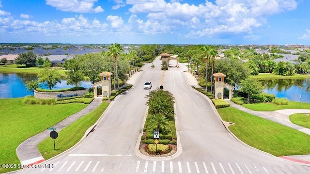 birds eye view of property featuring a water view