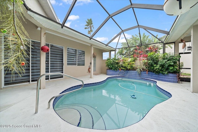 530 Carmel Dr, Melbourne, FL 32940 - pool featuring a lanai and a patio area