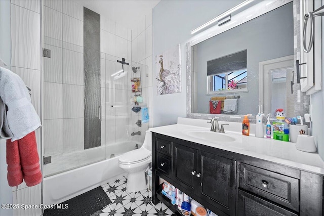 530 Carmel Dr, Melbourne, FL 32940 - full bathroom featuring enclosed tub / shower combo, toilet, and vanity