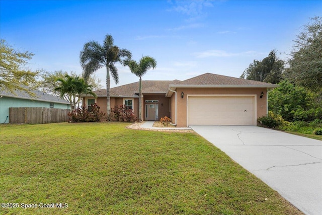 ranch-style house with driveway, a garage, fence, a front yard, and stucco siding