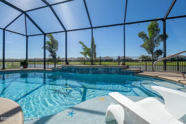 view of swimming pool featuring fence, a fenced in pool, and a lanai