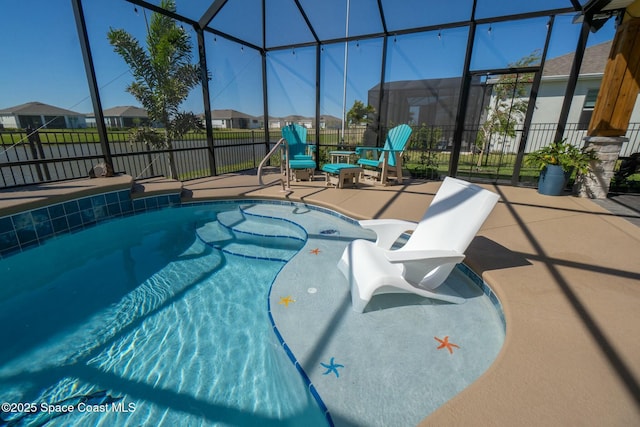 view of swimming pool with glass enclosure, fence, a fenced in pool, and a patio