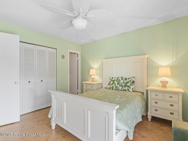 bedroom featuring a ceiling fan and a closet