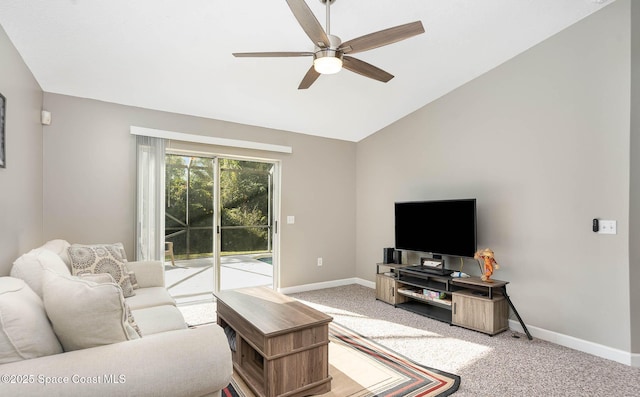 living area with lofted ceiling, baseboards, a ceiling fan, and light colored carpet