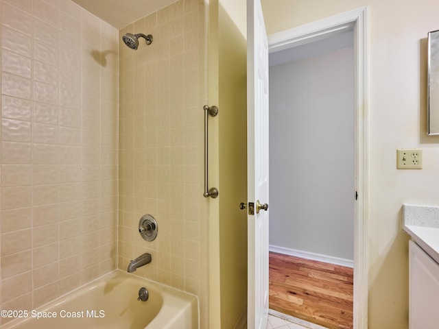 full bathroom with  shower combination and vanity