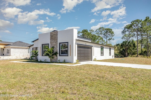 contemporary home featuring a front lawn, driveway, an attached garage, and stucco siding