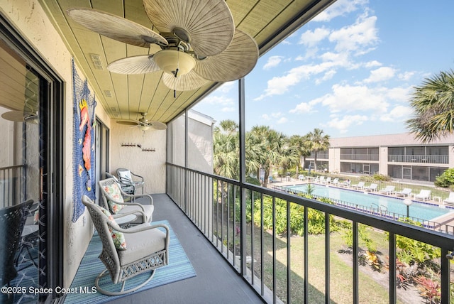 balcony featuring ceiling fan