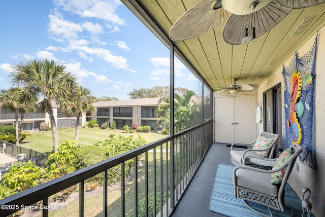 balcony featuring visible vents and a ceiling fan