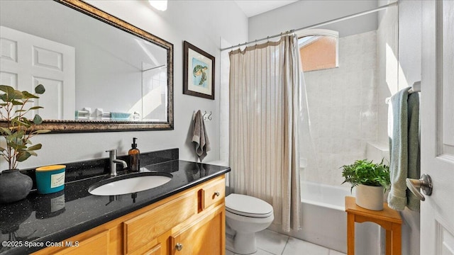 full bathroom with shower / bath combo with shower curtain, tile patterned flooring, vanity, and toilet