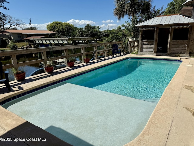 pool featuring a patio and a gazebo