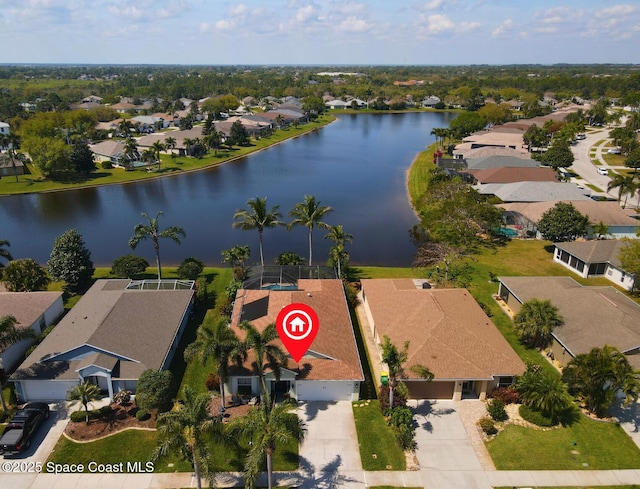 1073 Brumpton Pl, Rockledge, FL 32955 - bird's eye view featuring a water view and a residential view